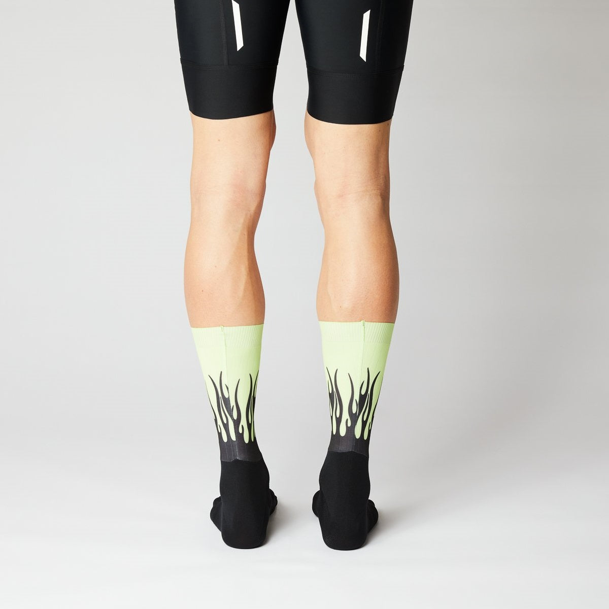 fingerscrossed-aero-socks-flames-black-neon-rear